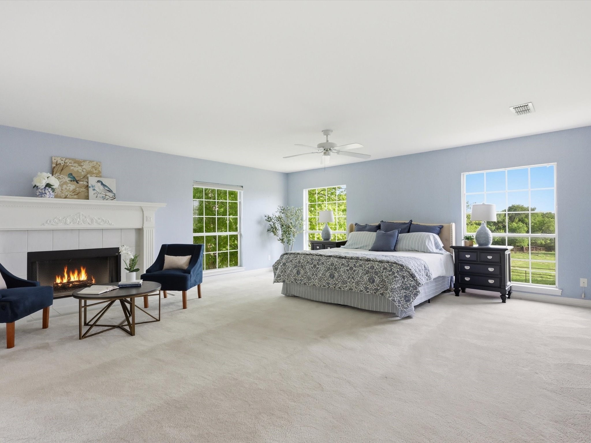 Aledo estate - staged primary suite with fireplace